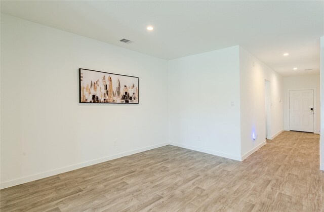 31714 Brandon Mill Trl, Fulshear, TX 77441 - unfurnished room with light wood-style floors and recessed lighting