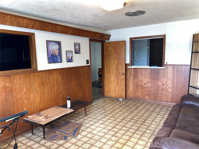 810 Thomas Ave, Pasadena, TX 77506 - living area with a wainscoted wall and wood walls