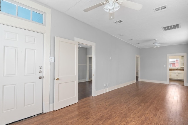 714 44th St, Galveston, TX 77550 - unfurnished living room featuring ceiling fan and wood finished floors
