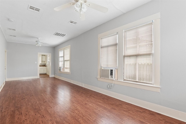 714 44th St, Galveston, TX 77550 - unfurnished room with a ceiling fan and wood finished floors
