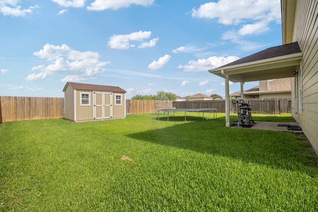 926 Seabourne Meadows Dr, Rosenberg, TX 77471 - fenced backyard featuring a trampoline and a storage unit