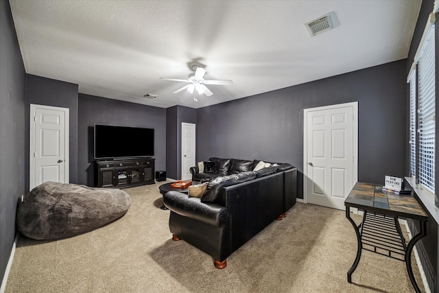 7815 Camden Hollow Ln, Humble, TX 77396 - living room featuring carpet floors and a ceiling fan