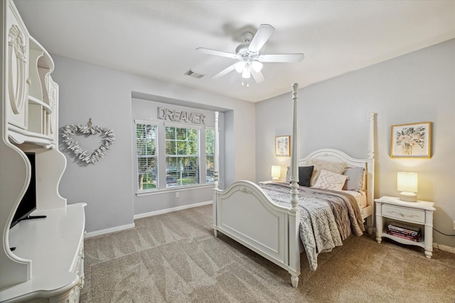 7815 Camden Hollow Ln, Humble, TX 77396 - bedroom featuring light colored carpet and ceiling fan