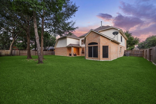7815 Camden Hollow Ln, Humble, TX 77396 - back of property with a fenced backyard and brick siding