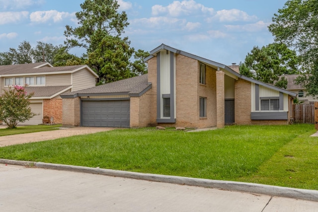 16830 Spruce Run Dr, Spring, TX 77379 - mid-century inspired home with brick siding, concrete driveway, an attached garage, and a chimney