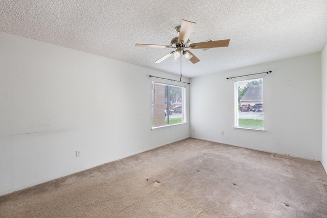16830 Spruce Run Dr, Spring, TX 77379 - unfurnished room with carpet flooring, a textured ceiling, and a ceiling fan