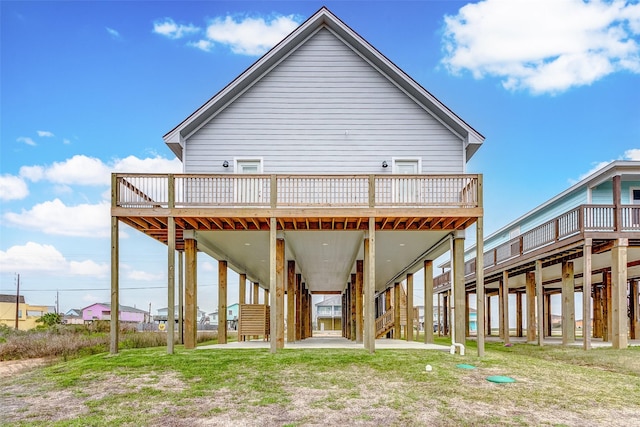 1743 Blue Water Hwy, Surfside Beach, TX 77541 - back of house featuring a deck