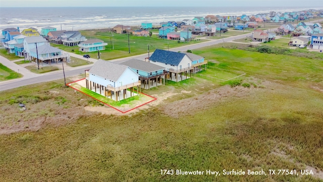 1743 Blue Water Hwy, Surfside Beach, TX 77541 - aerial perspective of suburban area with property parcel outlined