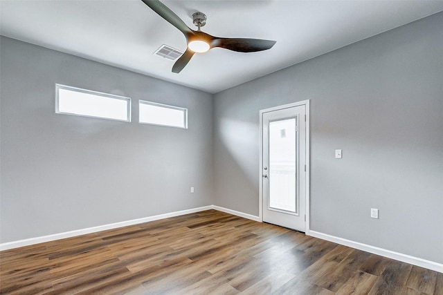 1743 Blue Water Hwy, Surfside Beach, TX 77541 - empty room featuring wood finished floors and a ceiling fan