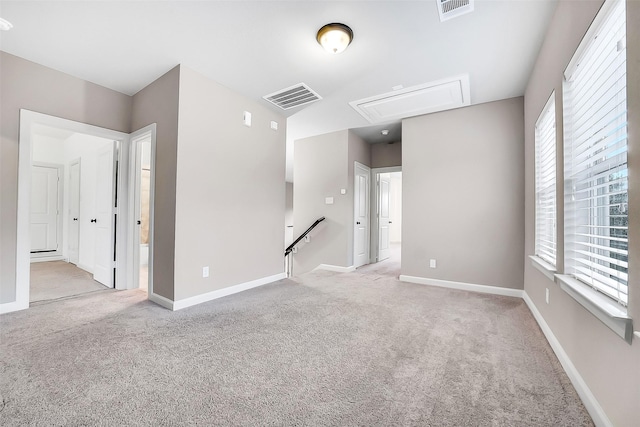 6222 Deer Run Xing, Katy, TX 77493 - empty room with attic access, carpet, and plenty of natural light
