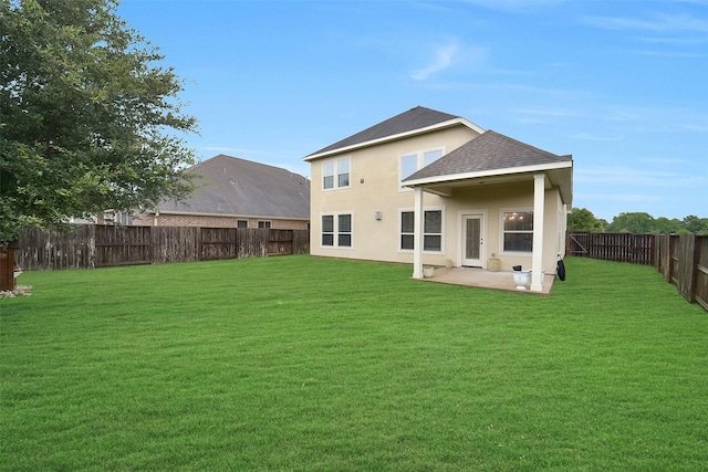 6222 Deer Run Xing, Katy, TX 77493 - rear view of house featuring roof with shingles, a fenced backyard, a patio area, and stucco siding