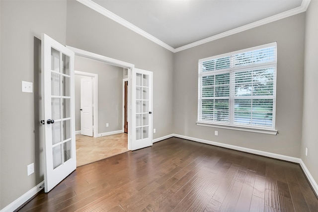 6222 Deer Run Xing, Katy, TX 77493 - spare room with french doors, ornamental molding, and wood finished floors