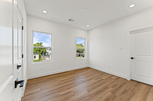 507 Middle St, Houston, TX 77003 - unfurnished bedroom with light wood-style flooring and recessed lighting