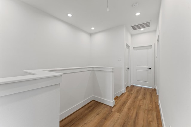 507 Middle St, Houston, TX 77003 - corridor featuring light wood-style floors and recessed lighting