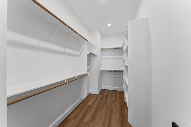 507 Middle St, Houston, TX 77003 - walk in closet with dark wood-style flooring