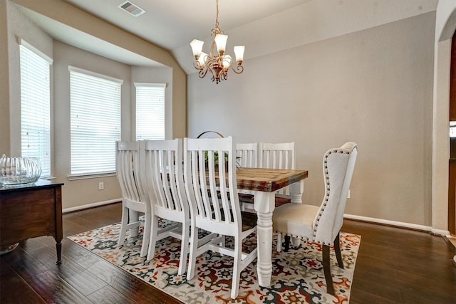 21714 Venture Park Dr, Richmond, TX 77406 - dining area featuring healthy amount of natural light, wood finished floors, and a chandelier