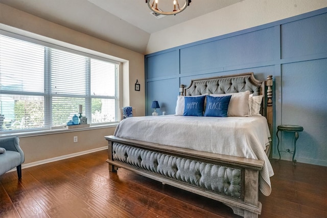 21714 Venture Park Dr, Richmond, TX 77406 - bedroom with lofted ceiling, wood finished floors, and a chandelier
