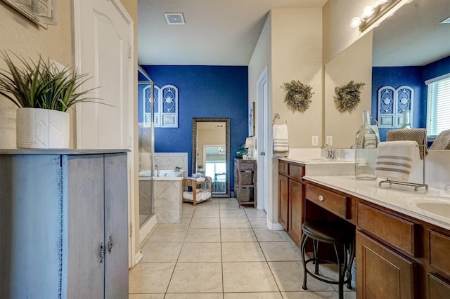 21714 Venture Park Dr, Richmond, TX 77406 - full bath with double vanity, a tub, tile patterned floors, and a shower with door