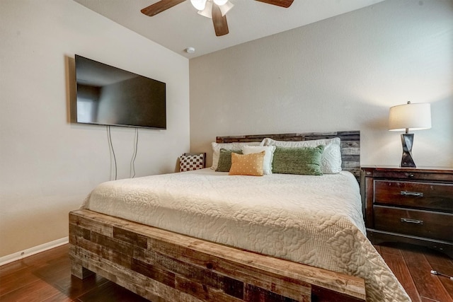 21714 Venture Park Dr, Richmond, TX 77406 - bedroom with dark wood finished floors and a ceiling fan