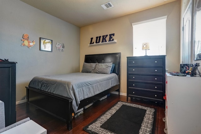 21714 Venture Park Dr, Richmond, TX 77406 - bedroom with wood finished floors and baseboards