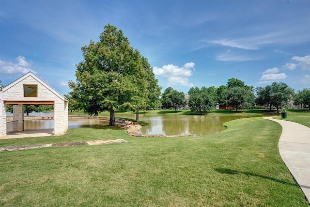 21714 Venture Park Dr, Richmond, TX 77406 - view of home's community with a water view and a lawn