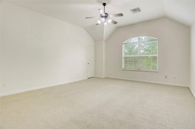 13508 Sweet Wind Ct, Pearland, TX 77584 - empty room with light carpet, a ceiling fan, and vaulted ceiling