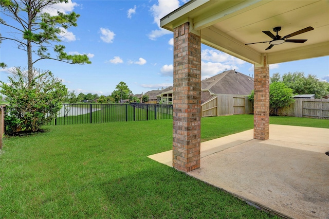 13508 Sweet Wind Ct, Pearland, TX 77584 - fenced backyard with ceiling fan and a patio