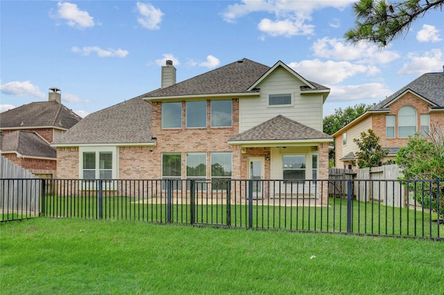 13508 Sweet Wind Ct, Pearland, TX 77584 - back of property featuring brick siding, roof with shingles, a fenced backyard, and a chimney