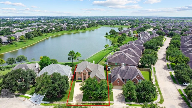 13508 Sweet Wind Ct, Pearland, TX 77584 - aerial view of residential area with property parcel outlined and a nearby body of water