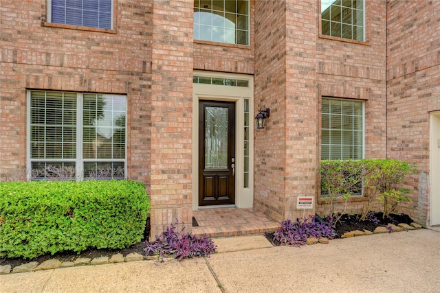13508 Sweet Wind Ct, Pearland, TX 77584 - doorway to property featuring brick siding