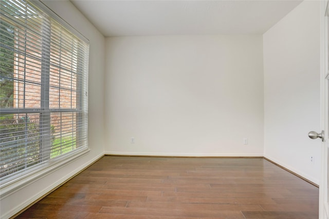 13508 Sweet Wind Ct, Pearland, TX 77584 - empty room featuring wood finished floors