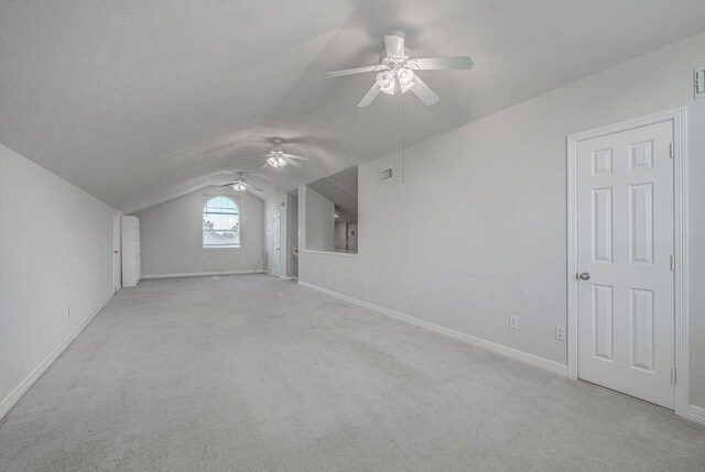 8014 Pine Wood Ct, Baytown, TX 77523 - bonus room featuring ceiling fan, lofted ceiling, and light colored carpet