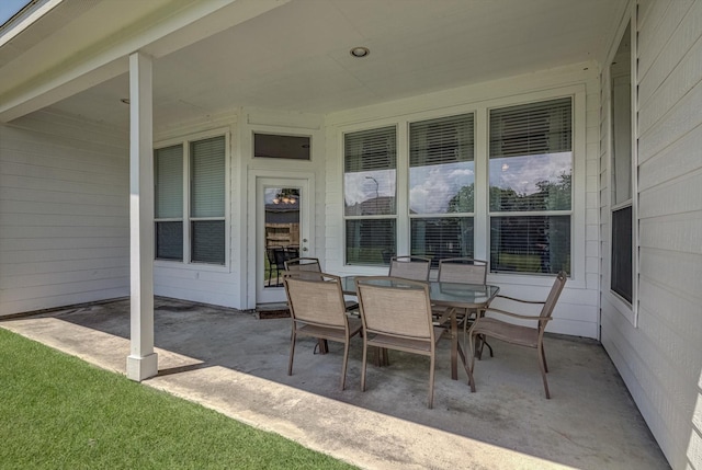 8014 Pine Wood Ct, Baytown, TX 77523 - view of patio featuring outdoor dining area