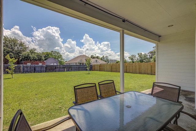 8014 Pine Wood Ct, Baytown, TX 77523 - fenced backyard with outdoor dining area