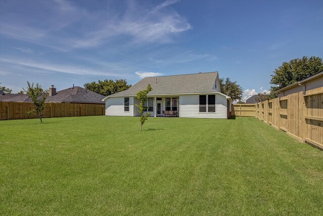 8014 Pine Wood Ct, Baytown, TX 77523 - back of property featuring a fenced backyard
