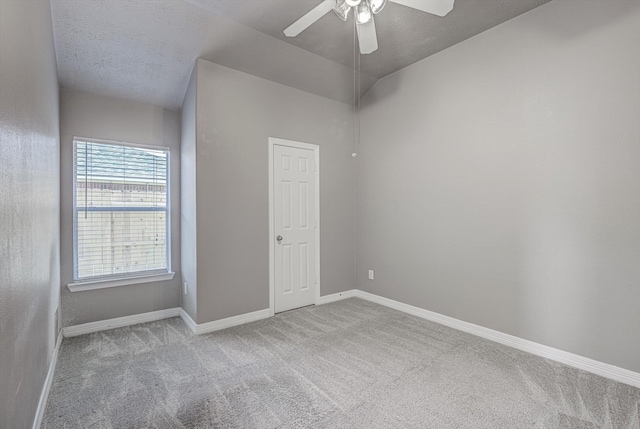 8014 Pine Wood Ct, Baytown, TX 77523 - carpeted empty room featuring baseboards and a ceiling fan