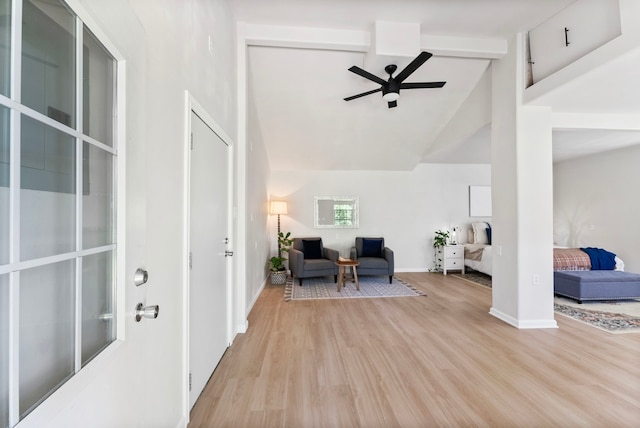 9119 Bush Buck Ln, Conroe, TX 77303 - foyer entrance with a ceiling fan, wood finished floors, high vaulted ceiling, and beam ceiling