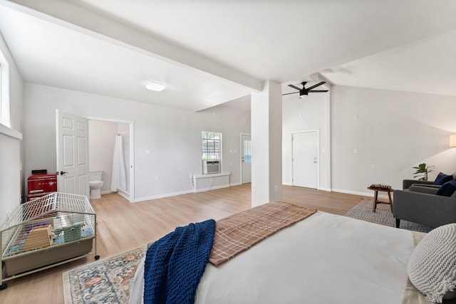 9119 Bush Buck Ln, Conroe, TX 77303 - bedroom with cooling unit and light wood finished floors
