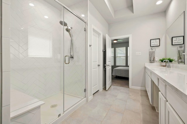 3023 Tantara Dr, Katy, TX 77493 - ensuite bathroom featuring vanity, a shower stall, a ceiling fan, recessed lighting, and tile patterned floors