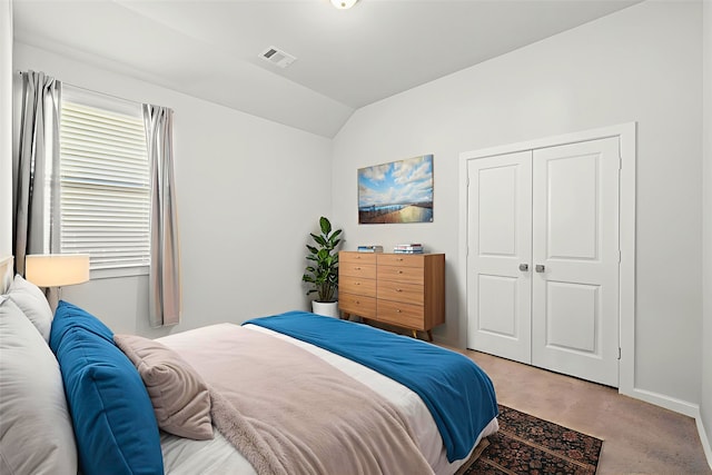 3023 Tantara Dr, Katy, TX 77493 - bedroom featuring vaulted ceiling, a closet, and light colored carpet