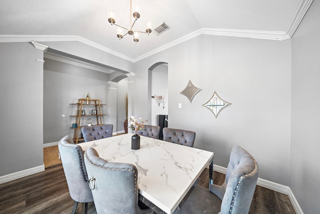 1727 Caldbeck Ln, Fresno, TX 77545 - dining space featuring a chandelier, dark wood-style flooring, lofted ceiling, decorative columns, and arched walkways