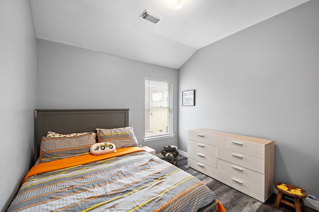 1727 Caldbeck Ln, Fresno, TX 77545 - bedroom featuring vaulted ceiling and dark wood-type flooring