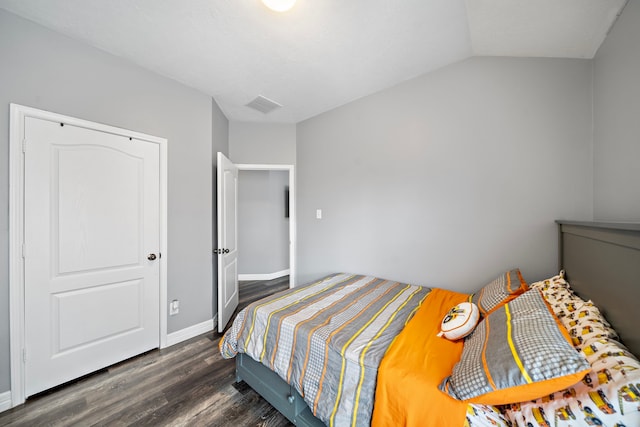 1727 Caldbeck Ln, Fresno, TX 77545 - bedroom featuring dark wood-style flooring and lofted ceiling
