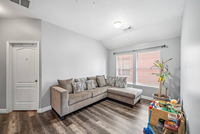 1727 Caldbeck Ln, Fresno, TX 77545 - living room featuring lofted ceiling and dark wood-style flooring
