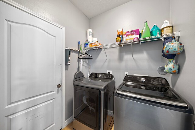 1727 Caldbeck Ln, Fresno, TX 77545 - washroom featuring separate washer and dryer