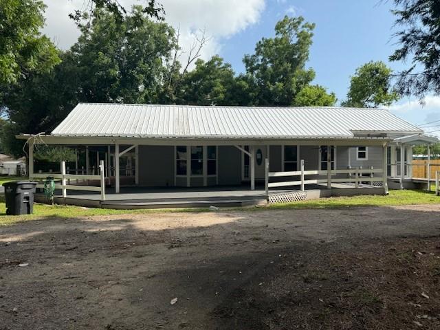 804 Tovrea Rd, Alvin, TX 77511 - view of front of property with a metal roof