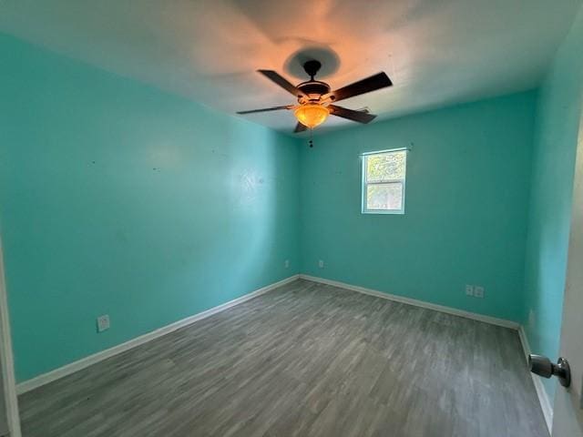 804 Tovrea Rd, Alvin, TX 77511 - unfurnished room featuring dark wood-type flooring and a ceiling fan