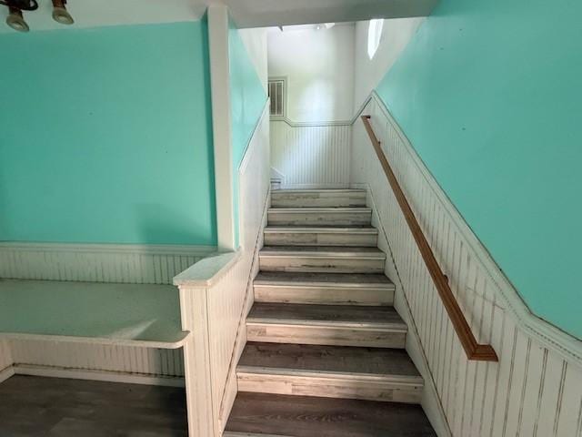804 Tovrea Rd, Alvin, TX 77511 - stairs with a wainscoted wall