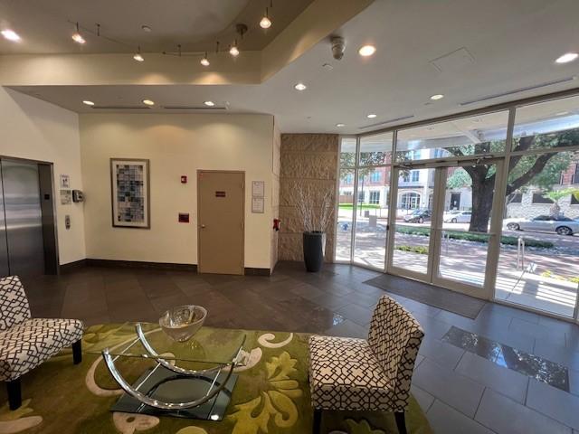 300 St Joseph Pkwy Unit 116, Houston, TX 77002 - lobby with expansive windows and recessed lighting