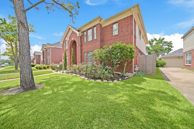 3207 Summerwind Ct, Pearland, TX 77584 - view of front of home featuring brick siding, a front lawn, and a garage